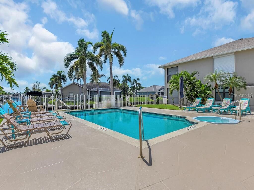 Photo of 902 SW 48th Terrace #105, Cape Coral, FL 33914 (MLS # C7515667)