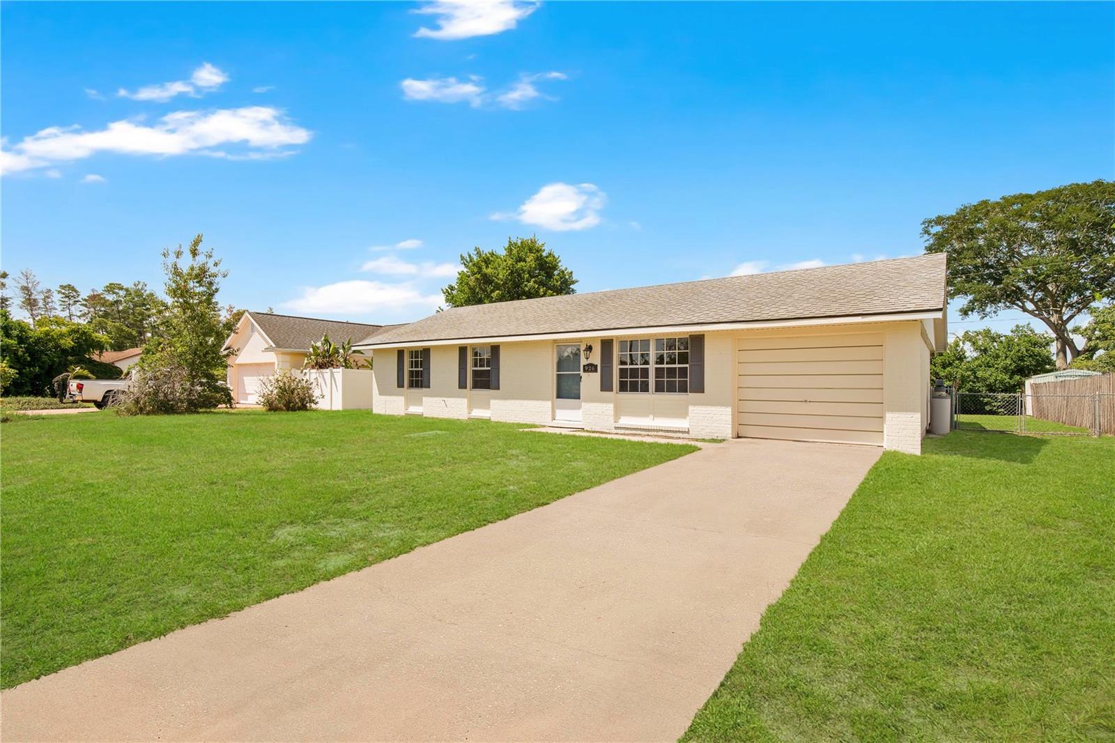 Welcome to 926 Wilmington Dr! This well maintained home sits on just under a quarter-acre with easy access to shopping, restaurants, and the interstate. Several recent upgrades provides you peace of mind and plenty of time to enjoy the large back porch and yard.
Step inside to find brand new luxury vinyl plank flooring in the living room and bedrooms, with tile flooring in the kitchen and bathrooms for easy maintenance. The freshly painted interior and exterior bring a bright, clean feel throughout
The kitchen is a great size with space for a dining table, perfect for everyday meals or casual entertaining. French doors lead from the kitchen to a large covered back porch, offering a great extension of living space and a relaxing place to enjoy the outdoors.
Key updates include:
- NEW Roof before closing!
- Brand NEW A/C system
- NEW septic tank
- Newer electrical panel
- NEW vanity and toilet in the hall bath
Conveniently located near Dewey O. Boster Sports Complex, shopping, and I-4 for an easy commute, schedule your showing today!