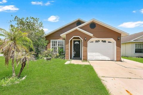 Photo of 9703 Red Clover Avenue, Orlando, FL 32824 (MLS # O6418829)