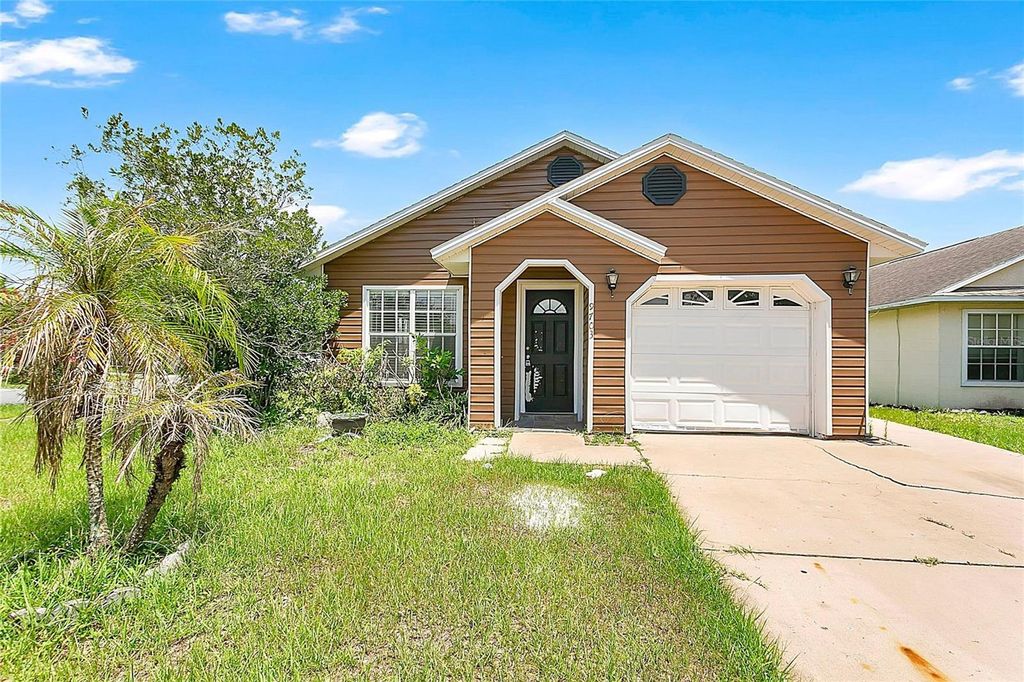 Photo of 9703 Red Clover Avenue, Orlando, FL 32824 (MLS # O6418829)