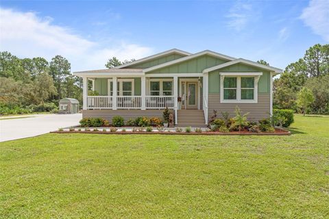 Photo of 875 Volco Road, Edgewater, FL 32141 (MLS # V4943386)