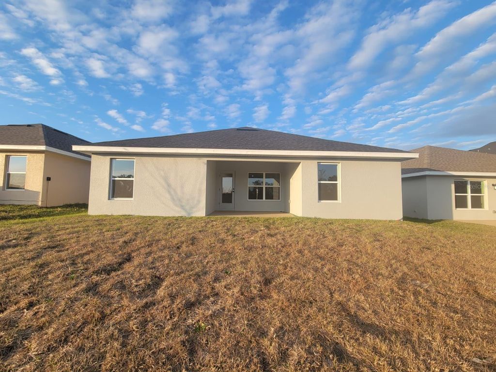 Photo of 266 Verny Grove Ln, Leesburg, FL 34748 (MLS # O6377935)