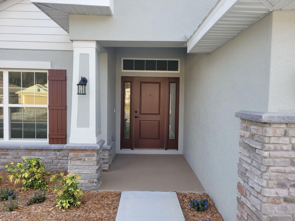 Photo of 266 Verny Grove Ln, Leesburg, FL 34748 (MLS # O6377935)