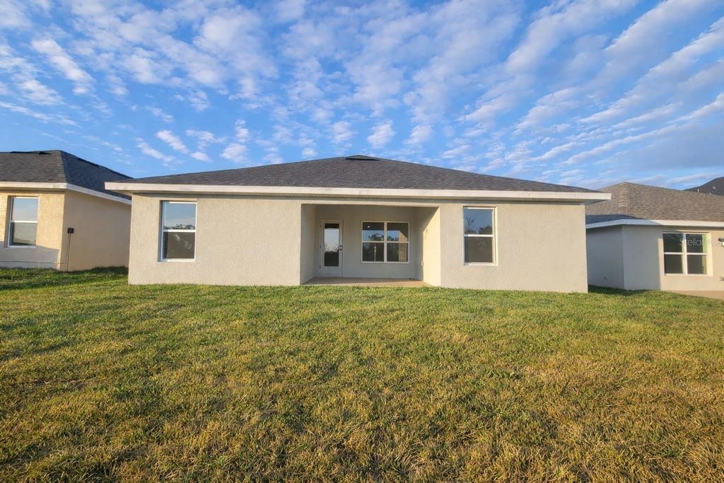 Photo of 266 Verny Grove Ln, Leesburg, FL 34748 (MLS # O6377935)