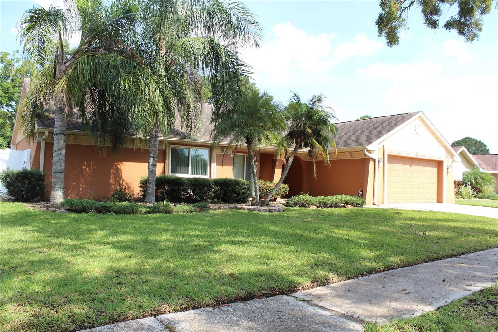 Gorgeous 4 bedroom/2 bath/2 car garage 2,075 sqft. Pool home, located in the neighborhood of Carrollwood Springs. This beautiful home features a kitchen with stainless steel appliances, granite counter tops, custom cabinetry, crown molding, breakfast area and closet pantry. Custom closet organizers, fireplace, pool and much more. Formal living room w/recessed lights, spacious dining room, Large family room w/fireplace and high ceilings. The master suite features a walk-in closet w/custom organizer and master bath has wood cabinetry and granite counters. Large outdoor screened covered lanai with tile floors overlooking pool.. A great location for schools, shopping, dining and all of the Carrollwood amenities. Close to the veterans, I-275 and I-75 with easy access to Tampa International Airport, Medical facilities, universities and more! Available for immediate move in. No pets. Monthly rent includes lawn care and pool maintenance.