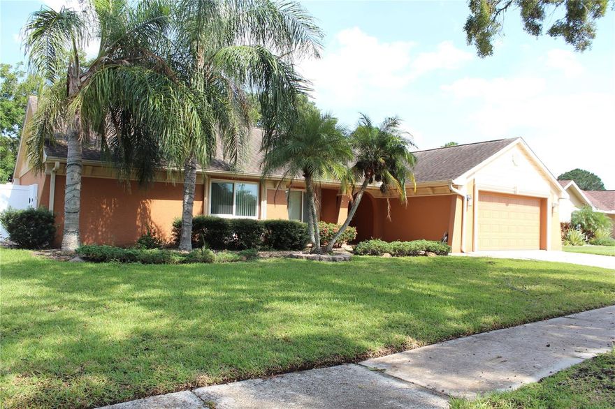 Gorgeous 4 bedroom/2 bath/2 car garage 2,075 sqft. Pool home, located in the neighborhood of Carrollwood Springs. This beautiful home features a kitchen with stainless steel appliances, granite counter tops, custom cabinetry, crown molding, breakfast area and closet pantry.  Custom closet organizers, fireplace, pool and much more. Formal living room w/recessed lights, spacious dining room, Large family room w/fireplace and high ceilings.  The master suite features a walk-in closet w/custom organizer and master bath has wood cabinetry and granite counters.  Large outdoor screened covered lanai with tile floors overlooking pool.. A great location for schools, shopping, dining and all of the Carrollwood amenities. Close to the veterans, I-275 and I-75 with easy access to Tampa International Airport, Medical facilities, universities and more!  Available for immediate move in. No pets.