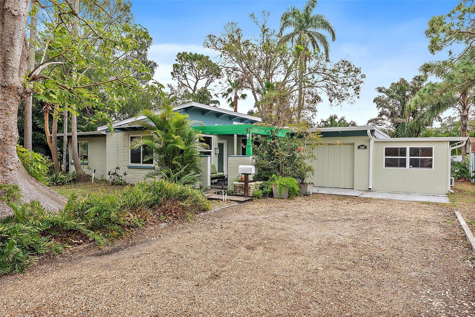 Welcome to Your Mid-Century Modern rental home in serene Bahama Shores.
This 1950s mid-century modern 3-bedroom, 2-bath home effortlessly blends timeless style with thoughtful modern updates. Recent updates include a new roof and skylight installed in 2022, along with over $35,000 invested in impact-rated windows and doors throughout the home. Outside, the pergola-covered courtyard provides a wonderful area for entertaining, while the large backyard offers endless possibilities for gardening or a play area. Situated on an expansive corner lot of over 12,000 square feet (105' x 120'), this property offers the perfect combination of space, charm, and functionality.
Inside, exposed wood beams, vaulted ceilings, and an open floor plan create a warm and inviting atmosphere. The spacious living room flows seamlessly into generously sized bedrooms, including a primary suite with its own en-suite bath for added comfort and privacy. The kitchen, with its all-wood cabinetry and two oversized windows, overlooks the serene private backyard, making it a delightful space to prepare meals and enjoy the view.
Practicality meets convenience with an oversized attached one-car garage that includes a hobby or workshop area and a separate storage room. A large shed in the backyard provides additional space for tools and equipment, ensuring there’s plenty of room to stay organized.
Located in the sought-after Bahama Shores neighborhood, residents enjoy access to a private waterfront park as well as Just 10 minutes away from our award winning Gulf Beaches and a stones throw from Bay Vista Park which offers a boat ramp for easy access to the water as well as numerous nearby biking and exercise trails. And with downtown St. Petersburg only 10 minutes away, you’ll have quick access to museums, fine and casual dining, parks, the Pier, arts districts, and vibrant year-round events.
This home is a true gem, offering style, comfort, and an unbeatable location.