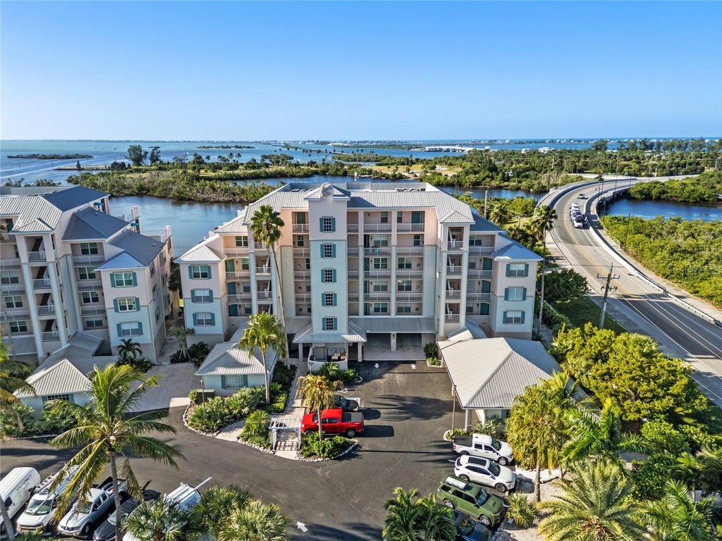 Photo of 13113 Gasparilla Road #A305, Placida, FL 33946 (MLS # D6149437)