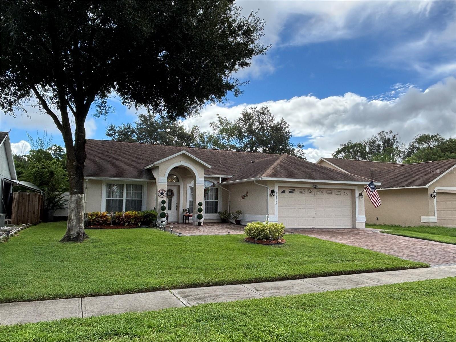 Enjoy all the comforts of home and beautiful 3 bedroom/2 full bath/2 car garage home with an open floor plan. This home boasts a formal living and dining area, combined kitchen, family room, and breakfast nook, and volume ceilings throughout. The main suite includes a walk-in closet with an en-suite, in a private split floor plan. The home has lighting and ceiling fans throughout. The interior includes Laminate Plank flooring in all bedrooms, Living, dining and Family room. Includes stainless-steel appliance package, garage w/ auto-opener, and washer and dryer. Host guests in your fenced back yard . Community pool and tennis court included. This property is move-in ready. Located in the charming community of Sturbridge just minutes from Waterford Lakes Town Center shopping and restaurants. Short 10 minute commute to UCF, Siemens, Science Dr., and Research Park. Located near the 408 E/W expressway, Alafaya Trail and more. Sells ASIS. Buyer is responsible to verify room measurements.