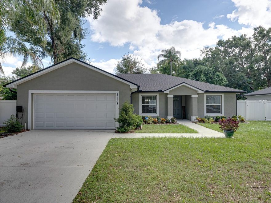 Move-In Ready- No HOA!- 3-Bedroom, 2 Bath, 2 Car Garage, Home in the Heart of Bartow.
This beautifully maintained, feature-packed 3-bedroom, 2-bath single-family home built in 2022 is ideally located in the heart of Bartow, FL. With 1,608 Sq ft. of living space, a modern open-concept layout, and no HOA, this home offers the perfect blend of style, function, and freedom. The open living and dining areas blend effortlessly, providing a warm and functional space for both daily living and entertaining. The kitchen impresses with granite countertops, stainless steel appliances, solid wood soft touch cabinetry, and a spacious breakfast bar. The primary suite offers a peaceful retreat with a walk-in closet, ceiling fan, and a luxurious en-suite bath complete with dual vanities, a soaking tub, separate walk-in shower, and a private water closet, your own spa-like escape. Step outside to a fully fenced backyard with rear access, perfect for boat or trailer parking. The patio is ideal for grilling, dining, or enjoying quiet Florida evenings, surrounded by tropical touches like mango and passion fruit trees. Additional features include a Generac whole-house generator for reliable backup power and an ADT-owned security system for added peace of mind. A washer and dryer are included for your convenience. Ceiling fans are installed in all bedrooms and living areas to enhance comfort year-round. The home also offers rain gutters, and an irrigation system to keep the exterior looking at its best.  This home is just minutes from downtown Bartow, schools, parks, and shopping, this home offers comfort, convenience, and long-term value. Schedule your private tour today and make this dream home yours!