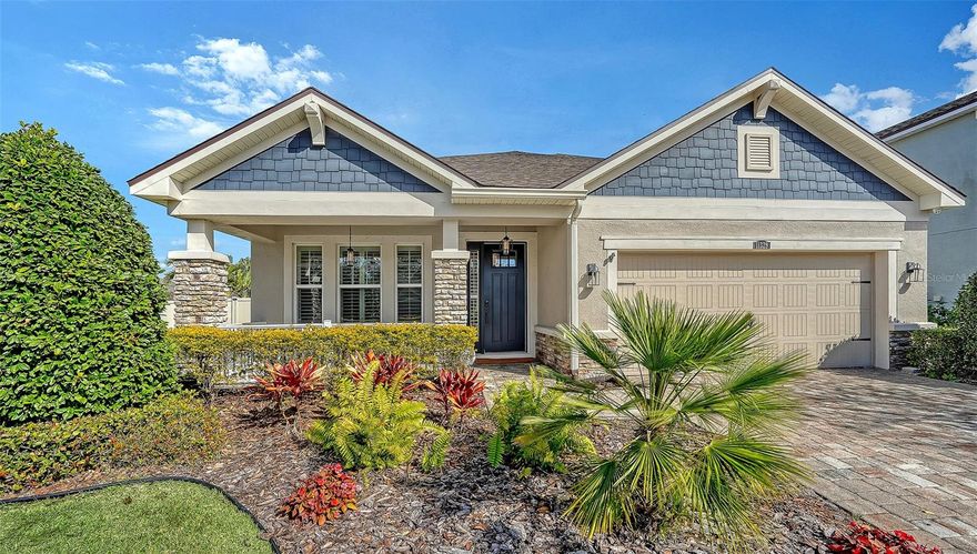 Experience luxury and comfort in this beautifully appointed 2-story Lakewood Ranch home that is perfectly situated on a spacious ¼ acre corner lot. Built in 2017, this sophisticated home offers 2,610 square feet of thoughtfully designed living space, featuring 4 bedrooms, 3 bathrooms, den/office, and versatile living areas to suit every lifestyle. The updated kitchen is a chef’s dream, complete with stainless steel appliances, a gas cooktop, and a striking glass tile backsplash. All three bathrooms have been beautifully updated.  Step upstairs to discover a second-floor loft and a separate bonus room that is ideal for a media space, playroom, additional office, or air-conditioned storage. The home is equipped with a tankless gas water heater, a separate laundry room, custom plantation shutters, a whole-house water filtration system, security cameras, and hurricane shutters. Enjoy Florida living at its finest in the private fenced backyard, featuring a screened-in paver lanai with an outdoor kitchen fueled by natural gas and a saltwater heated pool and spa—perfect for entertaining or relaxing. The 2-car garage includes an electric car charger for modern convenience and extra storage spaces. Recent upgrades include a new roof, new air conditioning units, and exterior paint, ensuring peace of mind for years to come. Living in Harmony means you’ll have access to a resort-style community clubhouse, heated pool, fitness center, and event space. Plus, lawn care and irrigation are included, giving you more time to enjoy the beautiful surroundings. Located minutes from top-rated schools, premier shopping, dining, medical care, I-75 access, serene trails winding through the preserve, and local parks and golf courses.  This home truly offers the best of Lakewood Ranch living.