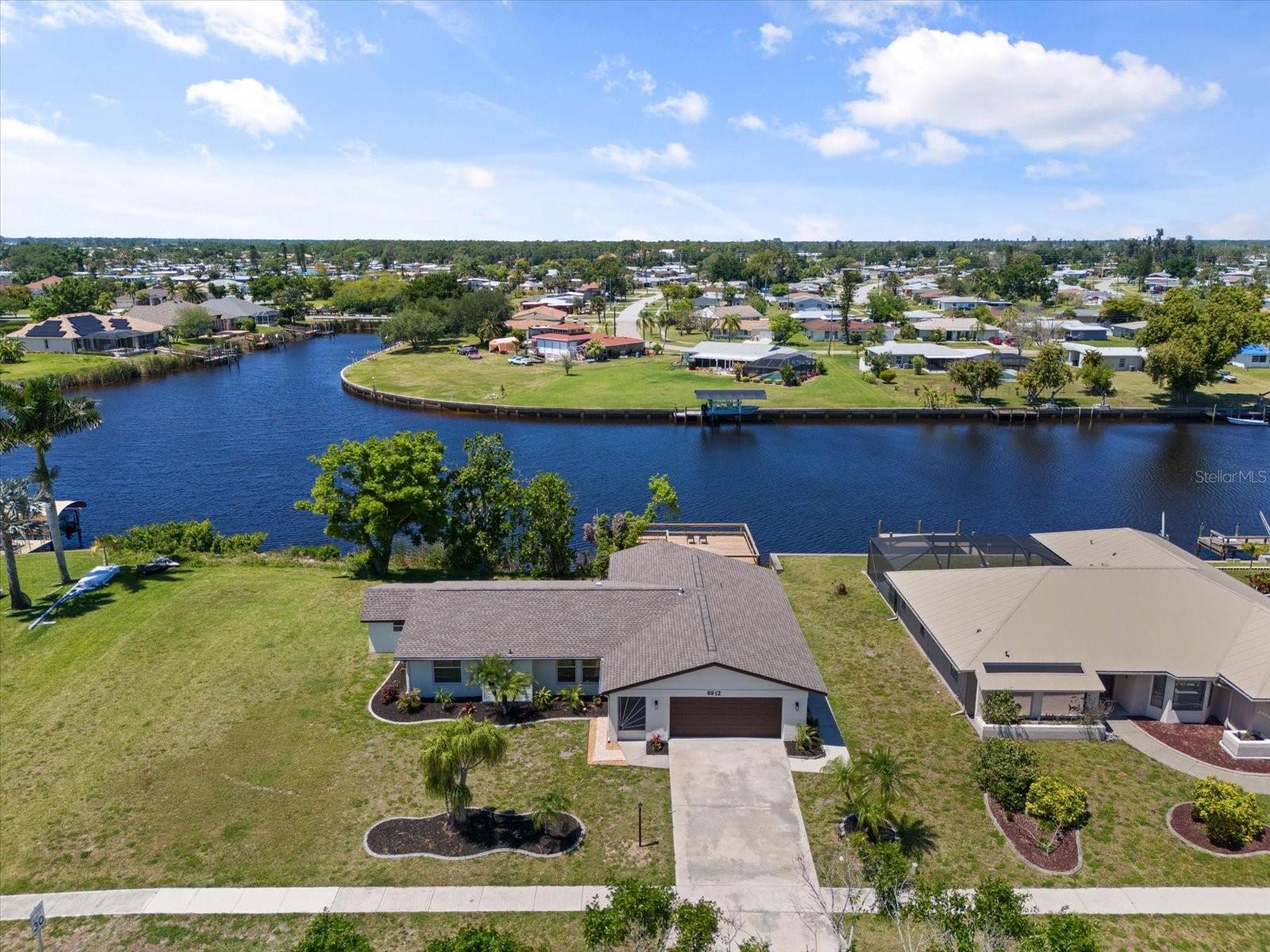Welcome to your waterfront oasis with gulf access! This fully renovated home boasts 3 bedrooms and 2 bathrooms, perfect for comfortable living. Enjoy the peace of mind that comes with a new roof and new mini splits in each bedroom so each one can be set at its on temperature. This home was redone top to bottom. Plus, no pesky HOA or CDD fees. The highlight of the home is the gourmet large kitchen, ideal for creating delicious meals and entertaining guests while overlooking the beautiful water views. Has a new GIANT dock to sit back and relax while catching your dinner or going out for a sunset cruise from your boat. Located in a great coastal neighborhood, you'll be close to everything Sarasota County has to offer, from beautiful beaches to vibrant city life. Don't miss this opportunity to embrace the Florida lifestyle in this stunning property on Kenwood Drive!