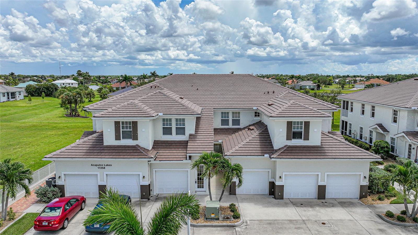 Welcome to this stunning 3-bedroom, 2-bathroom condo located in the desirable community of Burnt Store Lakes. Built in 2008 and offering 1,592 square feet of beautifully designed living space, this residence has everything you could want in comfort, style, and functionality. From the moment you step inside, you’ll notice the open and inviting layout that blends modern upgrades with timeless charm. The spacious living and dining area is perfect for entertaining or simply relaxing at the end of the day, while the abundance of natural light gives the entire home a warm and airy feel. The kitchen is designed with both form and function in mind, featuring plenty of cabinetry, ample counter space, and a layout that makes cooking and hosting a breeze. Whether you are enjoying a quiet breakfast or preparing a full holiday meal, this kitchen will quickly become the heart of your home. The primary suite is generously sized and offers a private retreat with its own en-suite bathroom. The additional two bedrooms are equally inviting, perfect for family, guests, or even a home office. Both bathrooms are stylishly appointed, offering a combination of comfort and practicality. One of the many highlights of this home is the upgraded flooring. With durable vinyl and sleek tile throughout, you’ll enjoy a clean, modern look with the added benefit of easy maintenance—no carpet in sight. The air conditioning system was replaced in 2023, providing peace of mind and energy efficiency for years to come. The hot water heater was also just replaced! The one-car garage adds convenience and storage, while the condo itself is tucked within a beautifully maintained community that’s known for its serene setting and Florida lifestyle. Burnt Store Lakes offers a variety of amenities, including nature-filled walking paths, a community park, and access to Burnt Store Marina right next door for boating, fishing, dining, and recreation. This condo truly stands out as a perfect combination of style, space, and location. With its thoughtful upgrades, spacious floor plan, and move-in-ready condition, it’s more than just a home—it’s the lifestyle you’ve been waiting for. Don’t miss your chance to own one of the best condos in Burnt Store Lakes and start enjoying the Florida living you’ve always dreamed of.