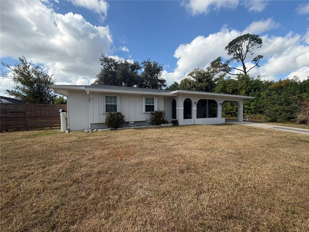 Photo of 1595 Adrian Street, Port Charlotte, FL 33952 (MLS # C7519774)