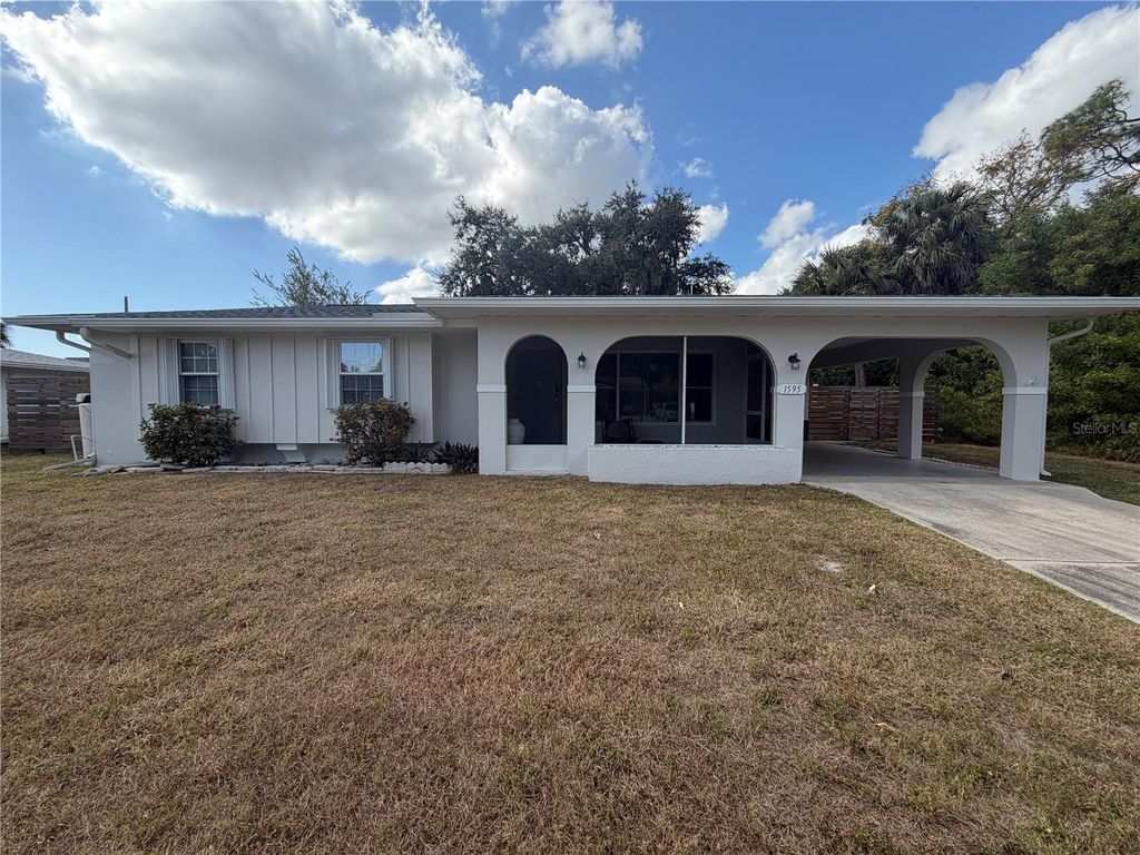 Photo of 1595 Adrian Street, Port Charlotte, FL 33952 (MLS # C7519774)