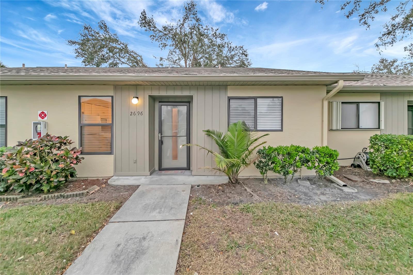 *** 2 BED 2 BATH GARDEN STYLE, SINGLE STORY CONDO HOME *** WELL CARED FOR WITH MANY RECENT UPDATES *** FRESH PAINT, NEWER ROOF & AC SYSTEM, UPDATED KITCHEN WITH QUARTZ COUNTERTOPS & ALL NEW FLOORING. HOA FEE INCLUDES ROOF, EXTERIOR, HIGH SPEED WIFI & CABLE. COME RELAX & ENJOY THE FLORIDA LIFESTYLE.