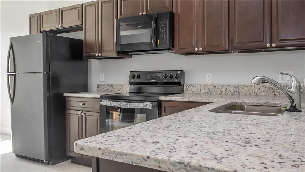 Photo of 401 Albatross Court #B, Kissimmee, FL 34759 (MLS # S5145162)