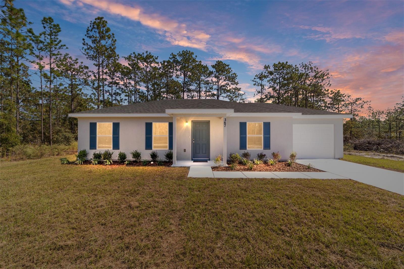 This split plan is open, light & bright. From the moment you walk through the front door you will feel the openness with the cathedral ceiling in the foyer, living room, and dining room! The kitchen comes complete with new stainless steel range, microwave, and dishwasher with ample counter space and cabinetry! A spacious pantry is conveniently located near the kitchen. Enjoy the morning cup of coffee at the breakfast bar or on the back patio. Do laundry with ease in the air-conditioned laundry room. This home rests on just under a 1/4 acre lot ~ enough room for the family & pets to play, but not too much yard work. The community center hosts regular activities and has outdoor pavilions available for event rentals. Amenities include basketball courts, tennis courts, pickleball courts, playgrounds, and a boat ramp and dock! All this with no HOA! The home is conveniently located to an abundance of outdoor recreational activities! It is just a short drive to the Withlacoochee or Rainbow Springs State Park for swimming, canoeing, tubing., fishing, boating, camping, and hiking the nature trails just to name a few! The World Equestrian Center is just minutes away. Builder is including a 1 year full warranty and a 2-10 home warranty! Any dimensions listed are approximate. Photos/Virtual Tour are to show interior and exterior colors and finishes and may or may not be of this actual listing. Garage orientation and floor plan may vary for actual home. BUILDER WILL PAY UP TO $4000.00 TOWARDS BUYERS CLOSING COSTS WITH FULL PRICE OFFER!