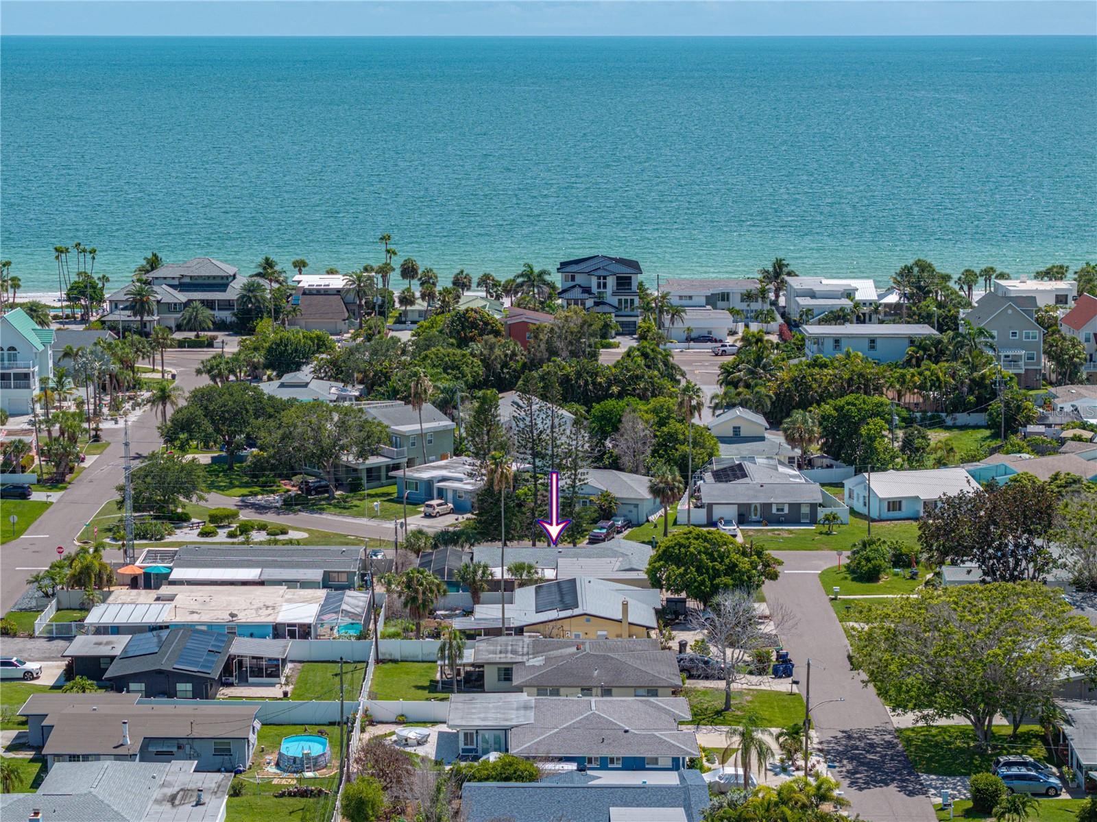 HOME IS NOT SUBSTANTIALLY DAMAGED PER CITY OF REDINGTON BEACH!! This home took on flood damage from Hurricane Helene. CASH ONLY, will need repairs. This home is just steps from the beach and is just the one you've been waiting for! Step into the epitome of coastal comfort with this lovely mid-century 4-bedroom, 2-bathroom POOL home in the coveted community of Redington Beach. With a new roof and AC system, this home is a symphony of simplicity, comfort, and Florida charm offering an unparalleled lifestyle amid the sun, sand, and sea. Upon entering, you're embraced by an abundance of natural light that floods through the open living spaces. The living room seamlessly flows into the heart of the home—the kitchen. Boasting a combination of butcherblock and tile countertops, updated cabinetry, stainless steel appliances, and a breakfast bar, it's a haven for both culinary enthusiasts and those who appreciate a warm, cozy design. The bedrooms, thoughtfully arranged for privacy, offer tranquil retreats. The real allure lies beyond the french doors—the private backyard oasis. The sparkling pool spans nearly the full length of the backyard and beckons for lazy afternoons or entertaining under the stars. This outdoor haven is your own slice of paradise, perfect for creating lasting memories with family and friends. Situated in the desirable Redington Beach community, you're just moments away from the pristine sandy shores and the vibrant energy of coastal living. Enjoy the quaint local shops, renowned dining spots, and the soothing sound of waves as your backdrop. This 4-bedroom, 2-bathroom pool home in Redington Beach is not just a residence; it's an invitation to embrace the Florida lifestyle in its purest form. Don't miss the chance to call this coastal haven your home. Contact us today to schedule your private tour.