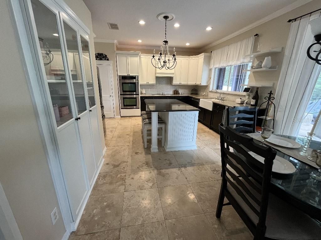 Photo of 5879 Lake Melrose Drive, Orlando, FL 32829 (MLS # TB8505480)
