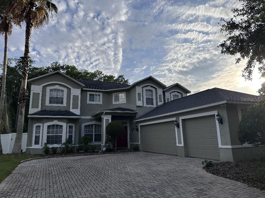 Welcome to Lake Melrose gated community with only 81 large homes. This 5-bedroom 3- bath 3-car garage private pool home is located in the highly desirable Melrose subdivision in Vista Lakes. Vista Lakes community is resort like living offering a fitness center, tennis courts, pickle ball courts, community club house you can rent for events, basket ball court, multiple pools, play ground, baseball batting cages, soccer field, scenic  walking trails and parks. The home is on a conservation wooded lot no rear neighbors.
The home features granite countertops in the kitchen and marble tops in the bathrooms. fully renovated modern bathroom and new hardwood flooring upstairs. Two story entrance. Chef inspired kitchen with granite, a big island double wall convection oven and stainless steel appliances and wine fridge. A large dining room that can hold a very large dining room table perfect for such a beautiful kitchen. The home has a newer roof 6 years old. Plenty of closets for storage. The primary bedroom has a screened in porch with a beautiful view of the wooded conservation and pool below. The home has a very long driveway perfect for hosting in this large home with plenty of parking for your guests.