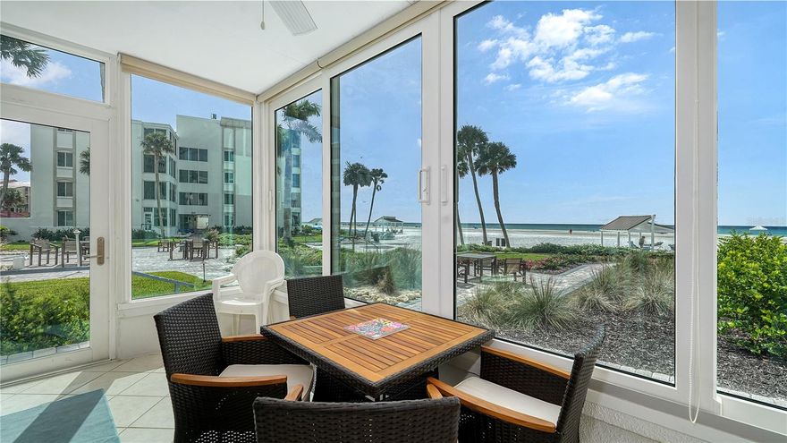 It's all about THE VIEW and the Direct Beach Access!!!  This first floor condominium has a Full Gulf View from the living room and glassed-in lanai. The water views are amazing, and the sunsets are gorgeous! You will walk out your front door right down to the sand to enjoy the warm Gulf water in minutes. There was no water intrusion and no water damage to this unit in past storms, as there are enough steps up from the level of the beach sand to make it elevated! Or use the ramp for easy luggage access.  The windows and doors are all wind and impact-rated, so you'll have peace of mind and a quieter home. All the floors are tile for easy care. The kitchen and bathrooms have been updated, including solid surface/granite counters and the elegant tiled showers.  Furnishings and appliances have been updated in the past year. This unit is move-in ready, or you can continue to rent it with a 3-night minimum for instant income (over $58,000 income after paying rental mgmt expenses in the first 9 months of 2025). On-site management is available for all your needs. The landscaping has been refreshed, there are new tables and chairs for outdoor dining or games, and beach chairs and chase lounges are provided, as well as shade under the condo's cabanas on the beach. Shuffleboard and corn-hole games await in the center greenway. The community pool is heated for your year-round enjoyment.  On the occasional rainy day, you'll enjoy the games in the club room (billiards, foosball, board games and puzzles). If you want to explore the Siesta Key Village shops, restaurants or nightlife, or explore Turtle Beach, just hop on the free trolley or other free ride-share vans. A 20-minute drive will take you to downtown Sarasota, including shops, restaurants, access to off-shore fishing or tour boats, opera, symphony, art museum, ballet, and live theater. With easy access to I-75, airport, colleges, Lifelong Learning, wine and spirits-tastings, and multiple parks and the Legacy Trail for biking, jogging, or skating, Sarasota and Siesta Key have it all!  This condo is your key to the fun, so bring your toothbrush and swim suit and ENJOY IT ALL!