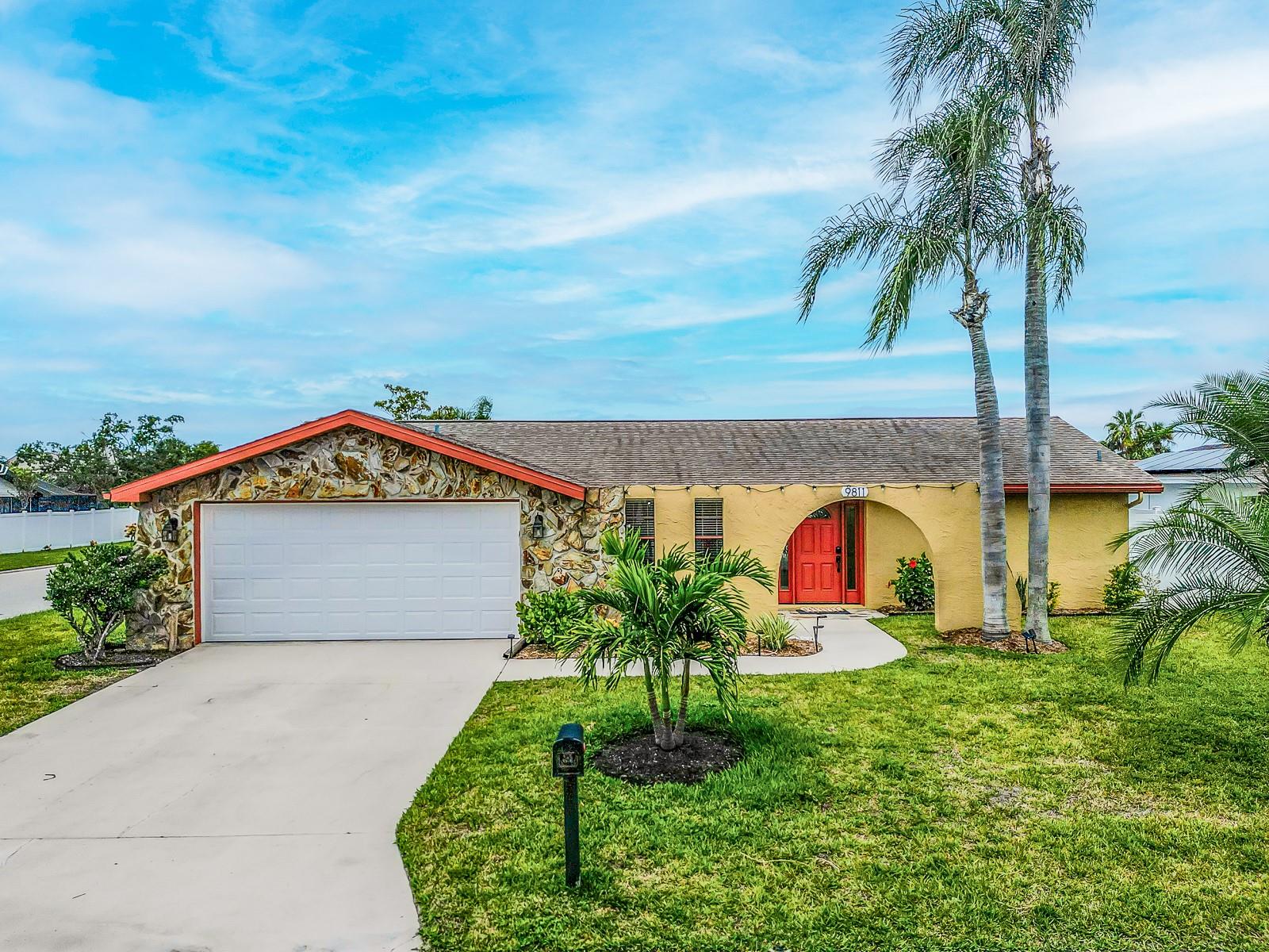 3/2/2 WATERFRONT POOL HOME !! Completely updated and PERMITTED !! GULF ACCESS !! OPEN FLOOR PLAN !! TRANSFERRABLE FLOOD POLICY !! Brand new continuous porcelain plank-style tile flooring; large living room with access to swimming pool lanai, stylish kitchen with marble counter tops and soft-close cabinetry, full suite of appliances and breakfast bar for 6. Adjoining space is currently used as a game room, overlooking the back yard.
Primary bedroom is spacious, includes a walk-in closet and ensuite bath, as well as access to the screened pool lanai. The third bedroom includes direct access to a second private lanai overlooking the canal.
A private, floating dock ensures direct access to the Gulf for all watersports and year round enjoyment.
This home is in pristine condition and well-maintained. No HOA and no CDD fees. AC 2023, Roof 2017, Pool pump 2023 - move in ready!