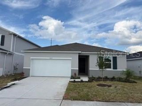 Photo of 10317 Honeysuckle Vine Circle, Riverview, FL 33578 (MLS # J995620)