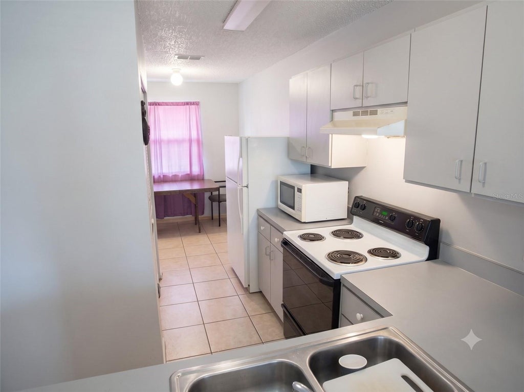 Photo of 4975 David Avenue, Sarasota, FL 34234 (MLS # TB8529444)