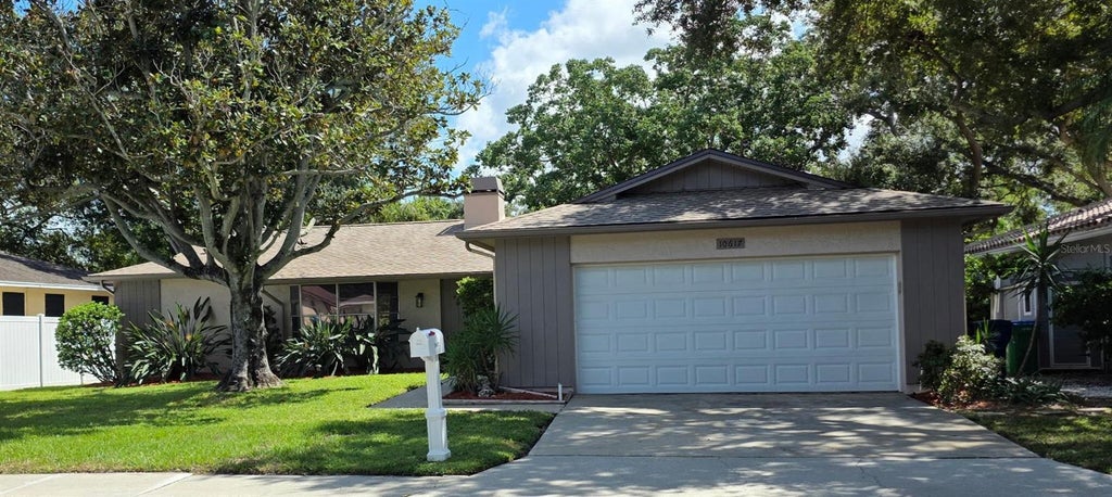 Photo of 10617 Seminole Forest Street E, Seminole, FL 33778 (MLS # O6447634)