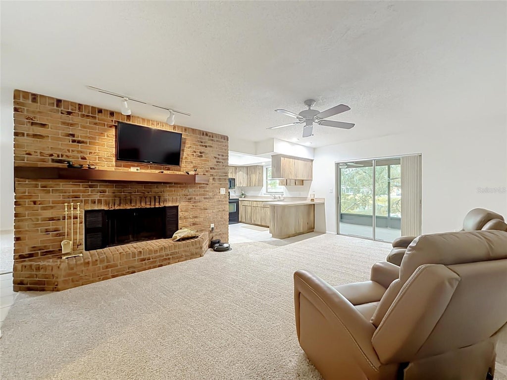Photo of 10617 Seminole Forest Street E, Seminole, FL 33778 (MLS # O6447634)