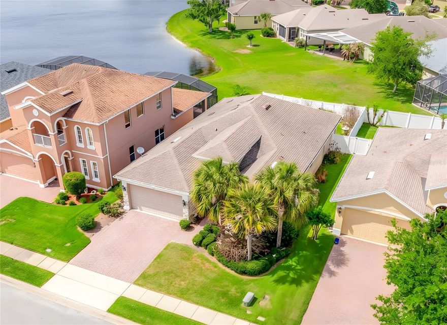 One or more photo(s) has been virtually staged. Seller may consider buyer concessions if made in an offer ~ Start your next chapter in this well maintained 3-bedroom, 2-bath, 2-car garage home in the desirable Oakbrook at Port Orange Landings community, where peaceful POND VIEWS and everyday convenience come together in one perfect package! Recent improvements include a NEWER A/C (2023), offering comfort and efficiency from day one. Inside, TILE & LUXURY VINYL PLANK FLOORING flow through the main living areas and guest bedrooms, creating a clean, cohesive look that’s both stylish and easy to maintain. Designed with space and functionality in mind, the home features formal living and dining rooms at the front, while the kitchen opens seamlessly to a generous family room – ideal for both everyday living with family and entertaining friends. The kitchen delivers a timeless layout with plenty of counter space, a decorative backsplash, pantry storage, UPGRADED APPLIANCES, a breakfast bar, and a casual nook overlooking the living space. Sliding glass doors from both the formal and family rooms lead to a SCREENED/EXTENDED PAVER LANAI with tranquil water views – your own private backdrop for Florida outdoor living. Whether hosting or unwinding, this indoor/outdoor connection makes the most of the setting. The SPLIT BEDROOM LAYOUT offers privacy, with the PRIMARY SUITE tucked away at the back of the home. Your relaxing retreat features DUAL CLOSETS (including a walk-in) and a well-appointed en-suite bath with dual vanities, a soaking tub, and a separate shower. Two additional bedrooms are positioned off the foyer, sharing a full guest bath, with the front bedroom enhanced by charming bay windows. Residents of Oakbrook enjoy access to a COMMUNITY DOCK overlooking the central pond, along with a park and playground. The location is hard to beat – just minutes to the Halifax River and area beaches, with shopping, dining, and daily essentials all close by. Plus easy access to I-95 makes commuting a breeze. If you have been searching for a spacious, move-in ready home with water views and a layout that truly lives well, this one checks all the boxes. Call today to schedule a tour!