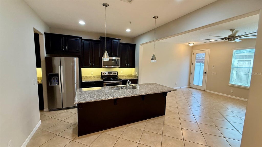 Photo of 8569 Vedder Lane, Orlando, FL 32832 (MLS # O6440362)