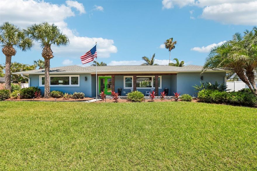 Welcome to the heart of Belleair Beach, a coastal community where life moves at a slower, more intentional pace. Perfectly positioned just moments from the sugar-white sands and Gulf-front sunsets that define Belleair Beach, this beautifully renovated pool home delivers the kind of lifestyle people move here for. As you arrive, the curb appeal immediately stands out, with fresh landscaping framing the exterior and setting the tone for what’s inside. Offering 4 bedrooms, 3 full bathrooms, and over 2,100 square feet of interior living space, this home sits on an oversized lot just under one-third of an acre, giving you the space that’s often hard to find this close to the beach. Step through the glass double front doors and you’re welcomed by wood-look tile flooring that flows throughout a light-filled interior. The layout is both functional and inviting, with the front living room seamlessly connected to the dining area just off the kitchen, creating an easy flow for everyday living and entertaining. Oversized sliding glass doors frame a beautiful view of the pool, bringing the outdoors in. The owner’s suite is a true retreat, featuring its own set of sliding glass doors leading directly to the pool area, creating the perfect way to start your mornings. The owners ensuite bathroom features designer tile flooring, dual vanities, and a seamless glass-enclosed shower with floor-to-ceiling tilework. The kitchen has been completely renovated with a modern design that feels both elevated and functional, showcasing rich espresso cabinetry, quartz countertops, a designer backsplash, and Bosch stainless steel appliances, including a sleek vent hood. Just off the kitchen, the family room offers additional living space with direct access to the lanai and leads into the private bedroom wing. This split floorplan provides flexibility and privacy, with two bedrooms connected by a Jack and Jill bathroom, while the third bedroom features its own sliding glass doors to the lanai. The third full bathroom has its own pool access, and is beautifully updated with a black-framed glass shower and stunning tilework. Step outside to a screened-in lanai designed for true Florida living, complete with a large inground pool surrounded by travertine tile and a covered patio accented by a warm wood ceiling detail. The backyard is expansive and fully fenced, with lush landscaping, generous green space, and a pathway leading to a dedicated firepit area, creating multiple spaces to relax or entertain. Beyond the home, the location continues to deliver with a short stroll to the beach and the Belleair Beach Marina right down the road. Boating, fishing, paddleboarding, or kayaking along the Intracoastal is right at your fingertips. Golf lovers will enjoy a short drive to both the Belleair Country Club and Pelican Golf Club, known for their beautifully maintained courses and upscale coastal atmosphere. Just minutes away, you’ll find the waterfront dining and coastal charm of Belleair Bluffs, along with local boutiques and everyday conveniences. With easy access to Clearwater and St. Petersburg, you’re never far from top-rated dining, shopping, and entertainment. Whether it’s a sunset walk on the beach, a day out on the water, or a casual dinner overlooking the coast, this location offers the perfect balance of everyday convenience and peaceful coastal living. This is where Florida lifestyle meets space, style, and a setting that truly feels like a hidden gem.