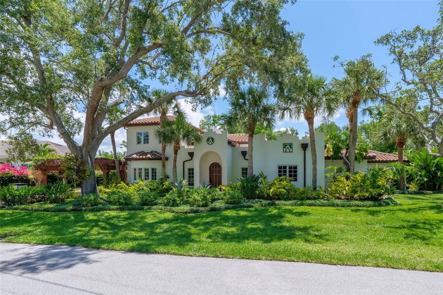 This completely updated warm contemporary home is situated in a stellar location, offering a desirable living experience. Upon entering through the custom hurricane wooden door, you are greeted by a sleek living room with tall ceilings and an open floor plan, creating a sense of serenity. The attention to detail in this home is evident in every aspect, and all components have been completely updated to meet modern standards. For specific details, please refer to the attached lists. Notably, the wood beams in the living room accentuate the dramatic height of the ceiling and large windows provide an unobstructed view of the courtyard, crystal clear pool, spa, and garden. The outdoor space is equally impressive, with a generous patio area that includes a natural gas fire table, custom seating, and well-designed lighting. It offers a perfect setting for relaxation and entertainment. The kitchen is a haven for culinary enthusiasts, designed to inspire creativity. While you prepare meals, your guests can unwind in the adjacent family room, enjoying the warmth of the wood-burning fireplace. This home offers flexibility in terms of the master suite. The second-floor master suite boasts a private balcony overlooking the courtyard and pool, allowing you to enjoy the outdoor ambiance. It also features a spacious sitting area or office and a truly luxurious en-suite bathroom. On the first floor, there are two guest bedrooms, and an additional room that can easily function as a spacious master suite. This room has a private bathroom and direct access to the courtyard and pool area. Located in the coveted Oyster Bay Estates, west of the trail, this property enjoys a prime location. Within minutes, you can reach the famous gulf coast beaches renowned for their natural beauty, as well as downtown Sarasota, known for its vibrant cultural scene, shopping, and dining options. Overall, this updated warm contemporary home offers a luxurious and comfortable living experience in an exceptional location.