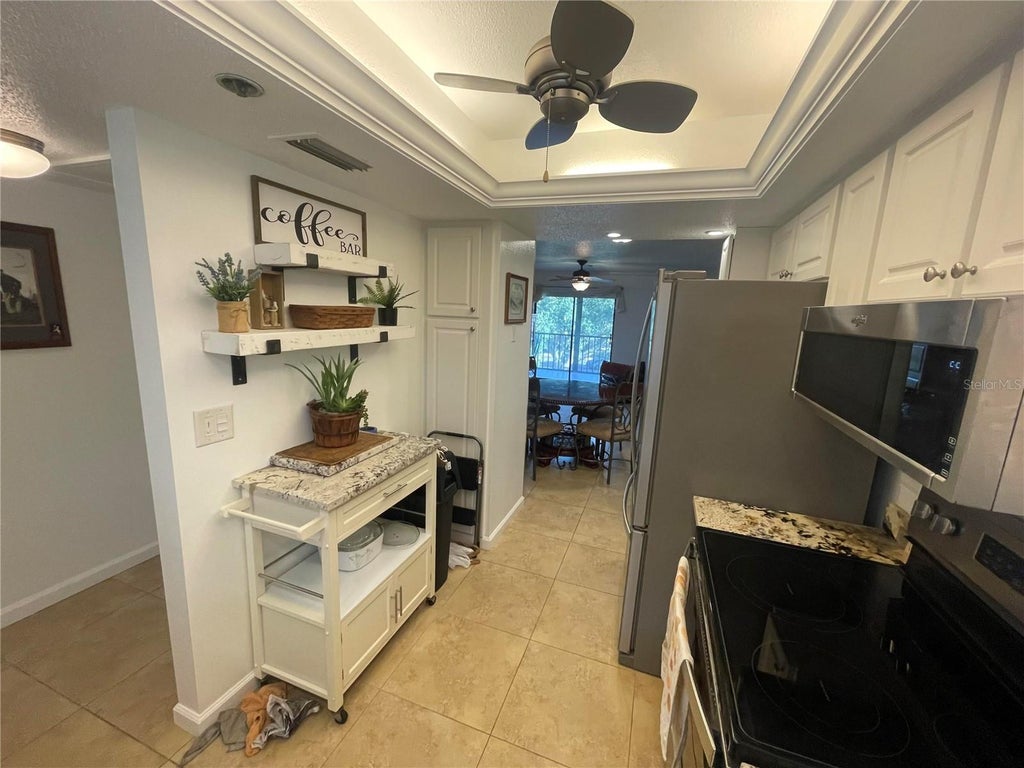 Photo of 104 Capri Isles Boulevard #304, Venice, FL 34292 (MLS # O6450667)