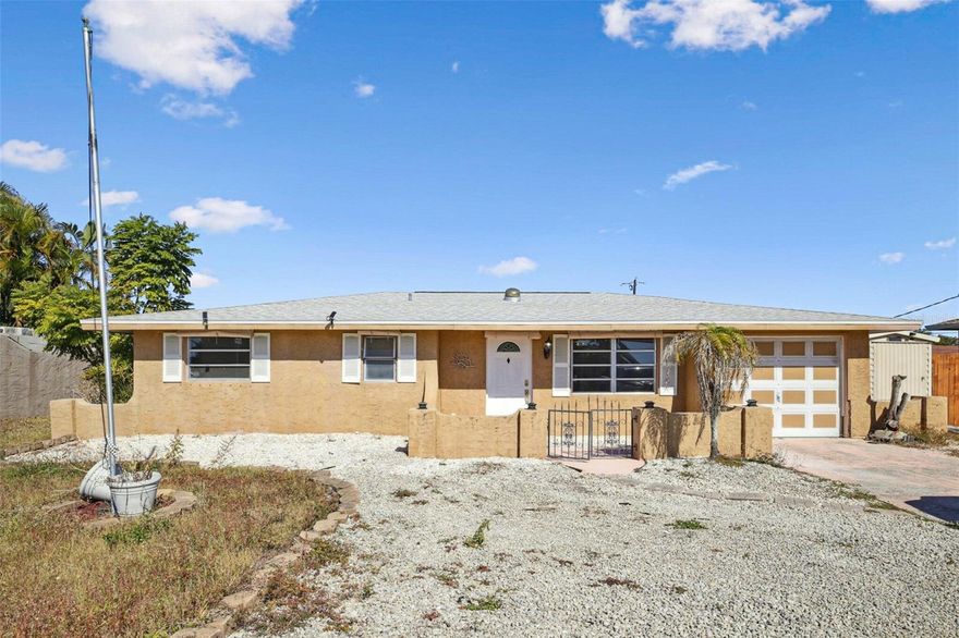 Discover this charming residence located on Edgewater Drive in Port Charlotte. This well-maintained home features a spacious layout with multiple bedrooms and bathrooms, providing ample space for comfortable living. The house boasts a Florida room and plenty of storage, while the inviting living area is appropriate for relaxation. Enjoy outdoor gatherings in the pool with a generous backyard, appropriate for entertaining. Conveniently located near local amenities and attractions, this home offers a great lifestyle opportunity.