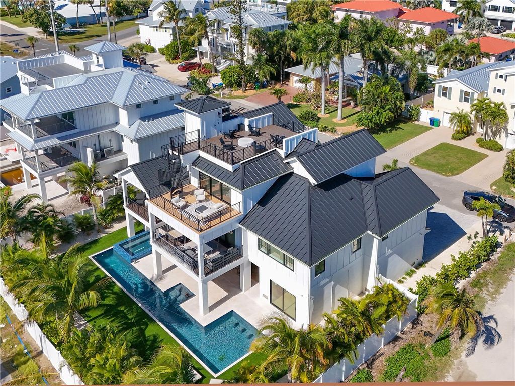 Photo of 305 55th Street, Holmes Beach, FL 34217 (MLS # A4672370)