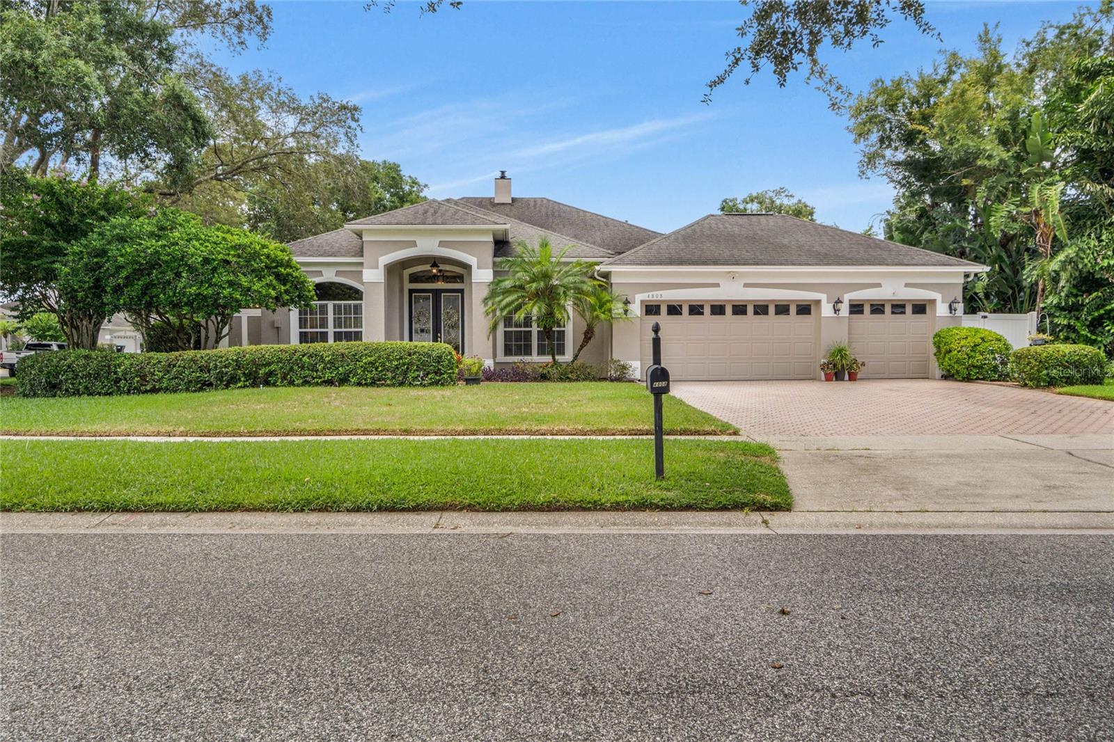 A NEW ROOF is scheduled to be installed on this beautifully maintained home nestled on a spacious corner lot in the desirable Gatlin Gardens community of Conway. This charming 3-bedroom, 3-bathroom home with 2705 Sq Ft offers a smart split floor plan, perfect for comfort, privacy, and everyday living. Step inside to find a warm and inviting family room with a cozy fireplace, separate formal living and dining rooms, and an abundance of natural light throughout. The expansive primary suite is a true retreat, featuring a generous layout and a luxurious oversized bath with dual vanities, soaking tub, and separate shower. Enjoy preparing family dinners in this chef inspired kitchen, with tons of storage and counter space, pantry and breakfast bar. Enjoy the outdoors year-round in the oversized screened lanai, ideal for entertaining or relaxing in privacy. Finally, the home's thoughtful design includes a 3-car garage, ideal for extra storage or a hobby/workshop area. All of this in an unbeatable location — just minutes from the Conway Chain of Lakes, Downtown Orlando, top-rated schools, shopping, dining, and Orlando International Airport (MCO).