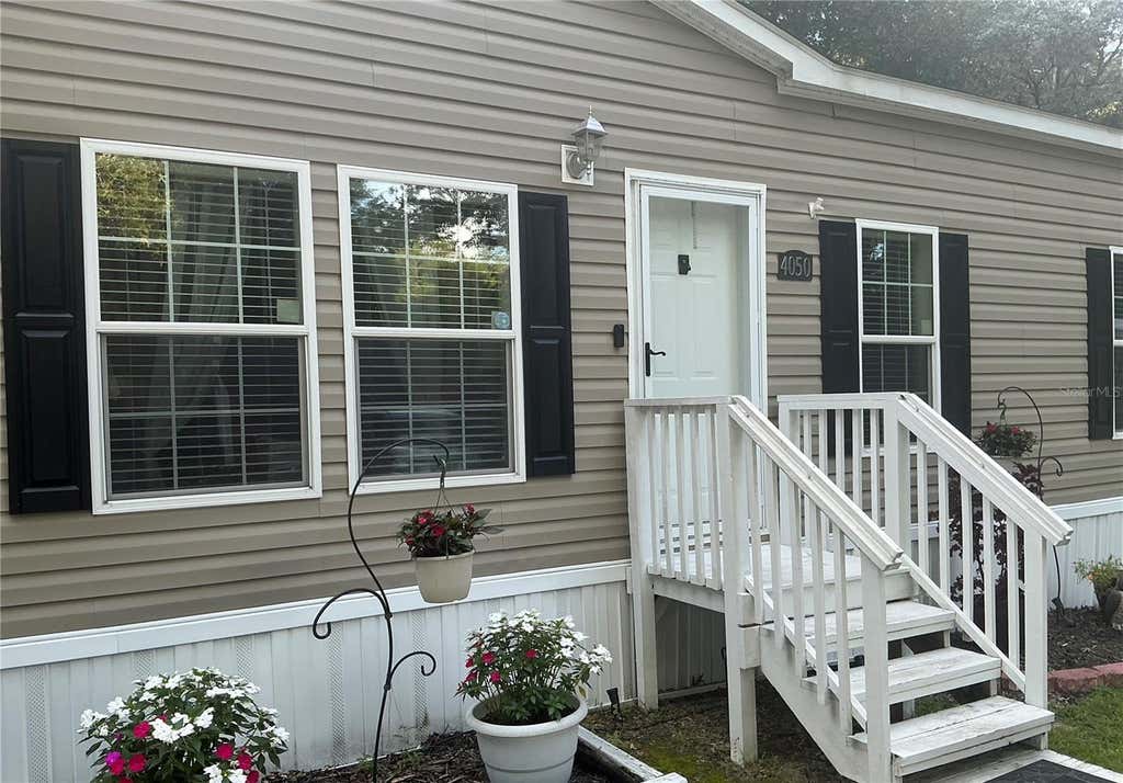 Photo of 4050 SW 178th Terrace, Dunnellon, FL 34432 (MLS # OM730486)