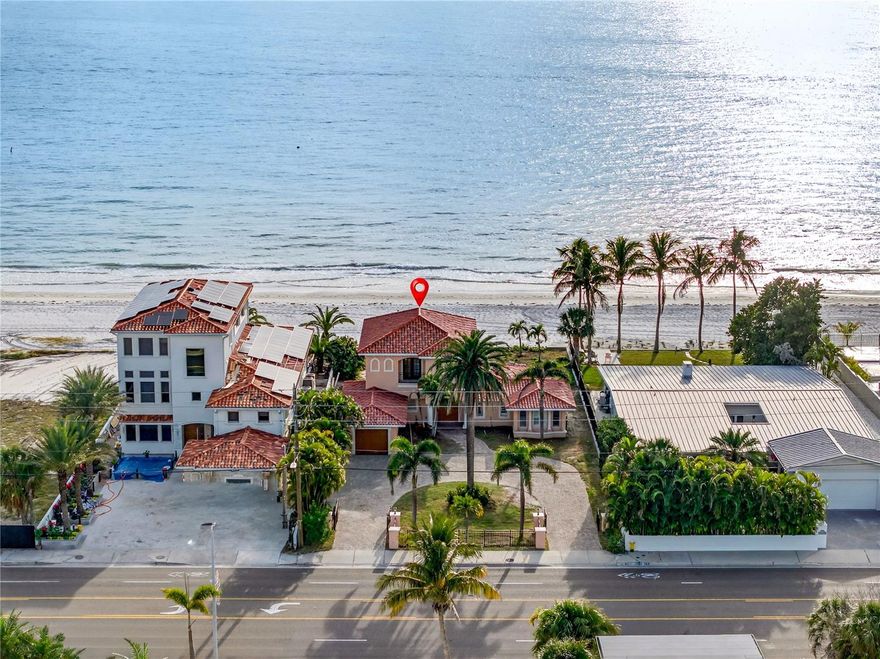 UNMATCHED GULF-FRONT OPPORTUNITY | 75 FT OF DIRECT BEACHFRONT | PRIVATE POOL | EXPANSIVE LOT  Welcome to 16116 Gulf Blvd, a rare opportunity to own 75 feet of pristine, direct Gulf frontage on a 191 x 75 ft beachfront lot in the heart of Redington Beach. This 3-bedroom, 4-bath coastal estate has been professionally remediated and is now ready for a new owner to bring their vision and finishing touches to life creating a truly custom Gulf-front paradise. Offering 2,952 sq ft of heated living space and 3,565 total sq ft, the home features travertine flooring throughout, all in excellent condition, and a layout designed to capture breathtaking water views. The entire second level is dedicated to the primary suite, providing a private retreat with panoramic views of the Gulf of Mexico and sugar-sand beaches, a spacious bedroom, and a spa-style bath filled with natural light. Outdoor living is a dream with a private beachfront pool, generous patio space, and direct access to miles of shoreline—perfect for enjoying sunsets, morning walks, and the coastal lifestyle Redington Beach is known for. Additional features include a one-car garage, a large circular driveway, and ample space for guests and entertaining.  Whether you envision a refined luxury retreat or a modern coastal masterpiece, this Gulf-front property offers the location, lot size, and foundation to make it extraordinary. Make this home your paradise and bring your beachfront vision to life.