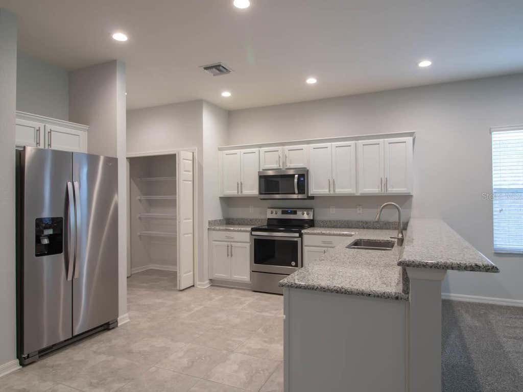 Photo of 1097 Grantham Drive, Sarasota, FL 34234 (MLS # A4699099)