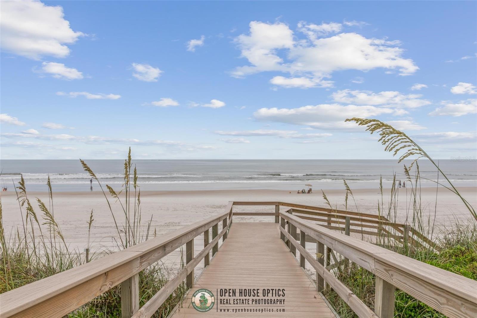 Are you ready to enjoy the benefits of coastal living? BRING YOUR VISION TO LIFE in this 2,100+ square foot home that's tucked-away on a private lot in the beach-side neighborhood of Seascape. This 3 bdrm 2.5 bath home provides easy access to the gated beach walkway. Located East of A1A between Butler & Crescent Beaches, you'll appreciate going on seaside strolls without having to cross A1A or search for parking. Voluminous ceilings with two large skylights give a sense of openness in the great room & dining areas; and, the eat-in kitchen offers lots of natural light. The primary & second bedrooms are on the ground floor with a third bdrm & private bath upstairs. A sun-room on the back of the home overlooks approx. 84' of natural wooded property & a small patio. Conveniently located: SR 206 (1/2 mile), Shopping (4 miles), St Augustine Pier (6 miles) & close to all St Augustine attractions. 30 day min. required for rentals. Don't miss this opportunity; Call today & see this unique home!