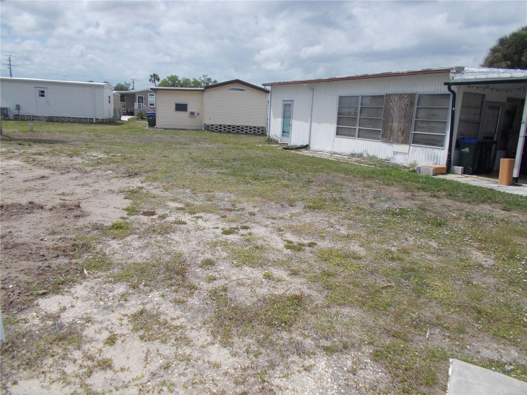 Photo of 6759 Neighborly Court, North Port, FL 34287 (MLS # C7524284)