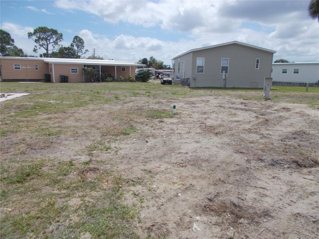 Photo of 6759 Neighborly Court, North Port, FL 34287 (MLS # C7524284)