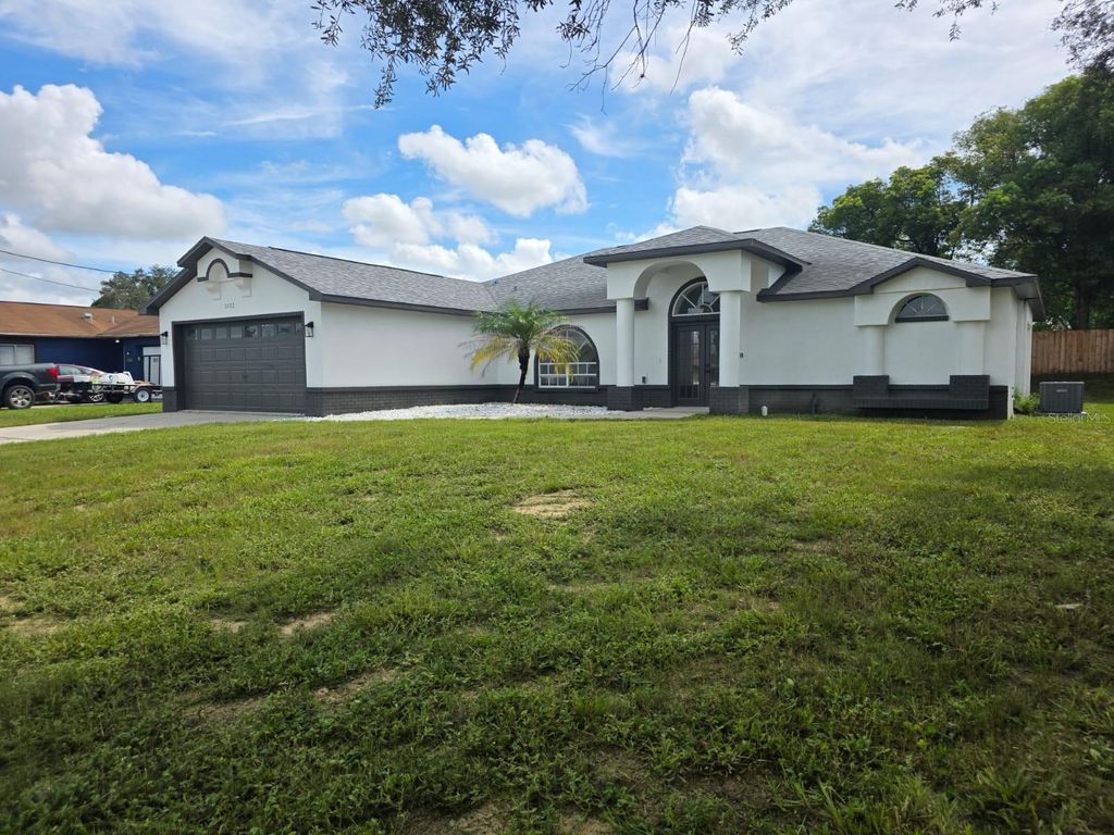 Photo of 1032 Concert Avenue, Spring Hill, FL 34609 (MLS # W7873394)