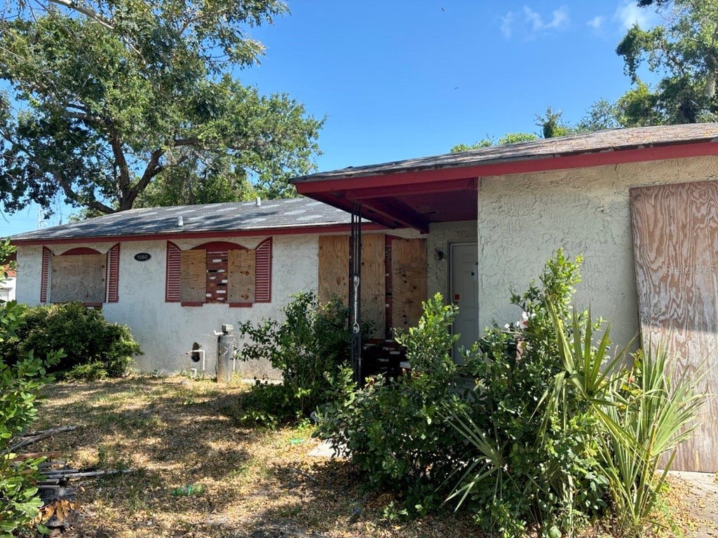 Photo of 1580 Oak Village Drive, Largo, FL 33778 (MLS # TB8513160)