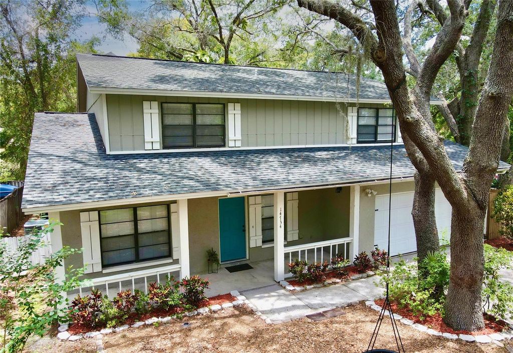 Photo of 14734 LAKE FOREST DRIVE, LUTZ, FL 33559 (MLS # T3452867)