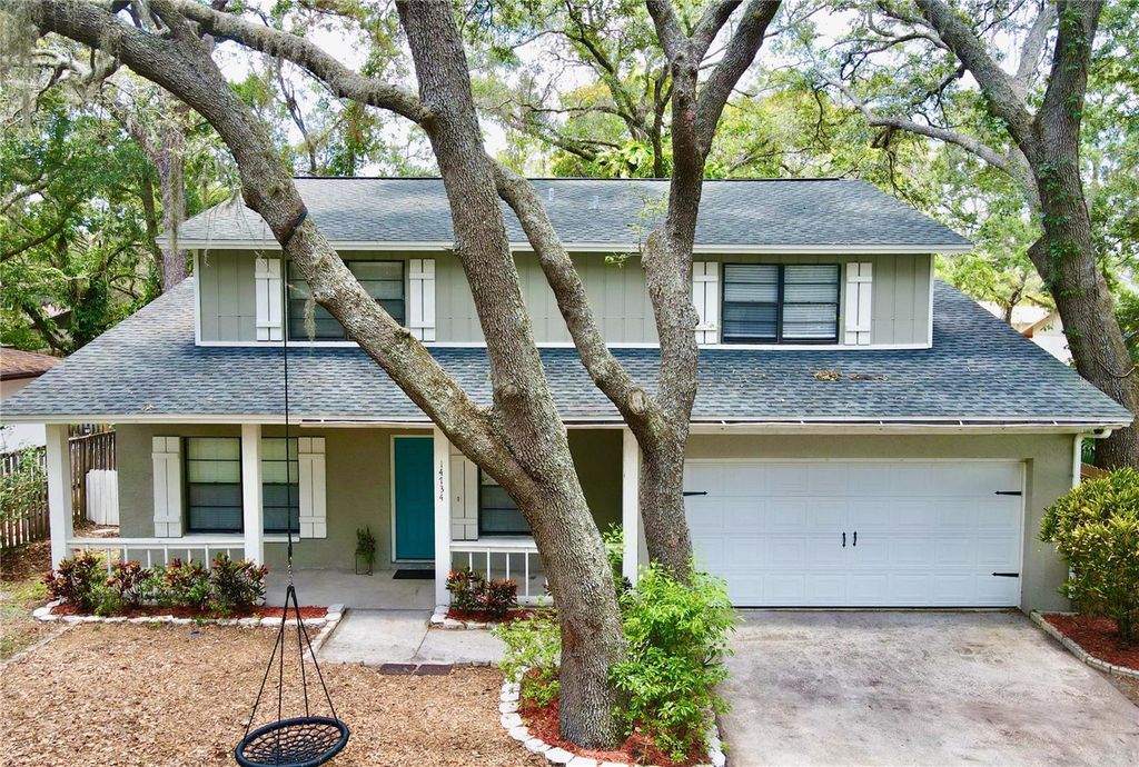 Photo of 14734 LAKE FOREST DRIVE, LUTZ, FL 33559 (MLS # T3452867)