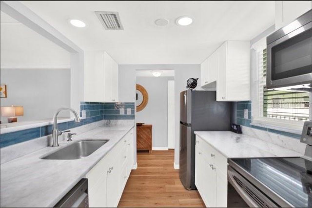 Photo of 464 N Paula Drive #301, Dunedin, FL 34698 (MLS # TB8426703)